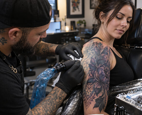 Can a cover-up tattoo completely hide a name or an old portrait